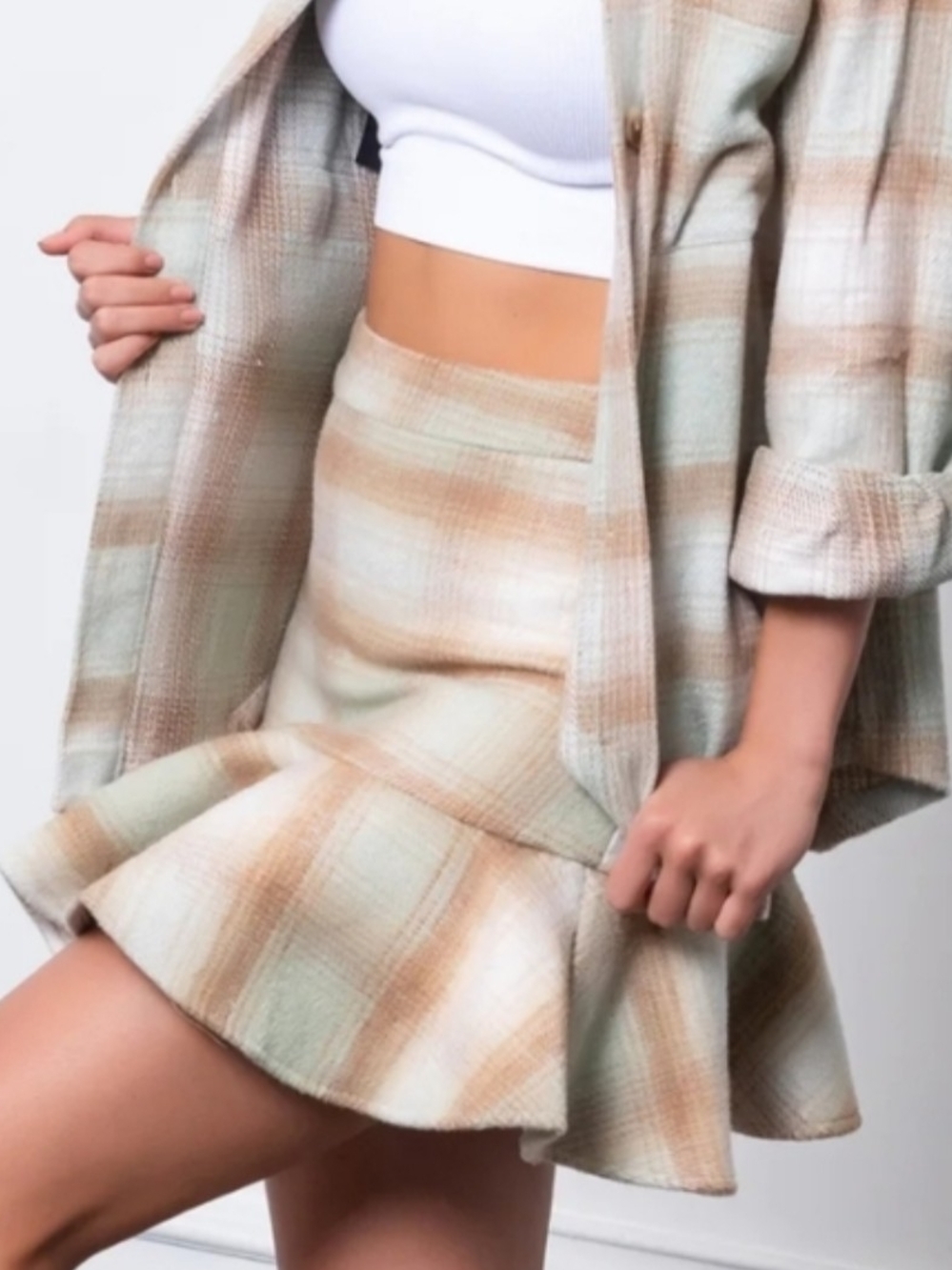 Moodie Plaid Ruffle Hem Mini Skirt